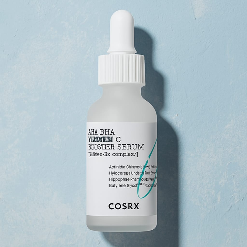 COSRX AHA BHA Vitamin C Booster Serum on light blue background